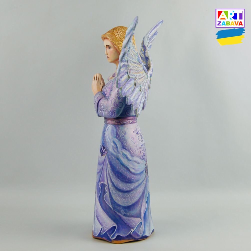 Hand-carved and painted 7.8-inch Blue Angel figurine made from eco-friendly linden wood. Detailed craftsmanship highlighting Slavic culture.